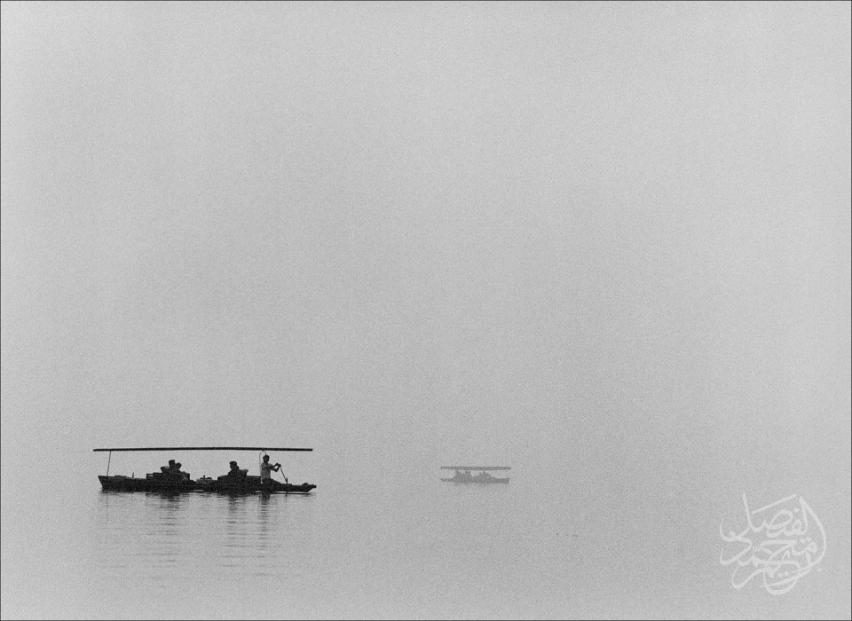 China - Hangzhou, Boats in the Mist الصين - هانغتشو